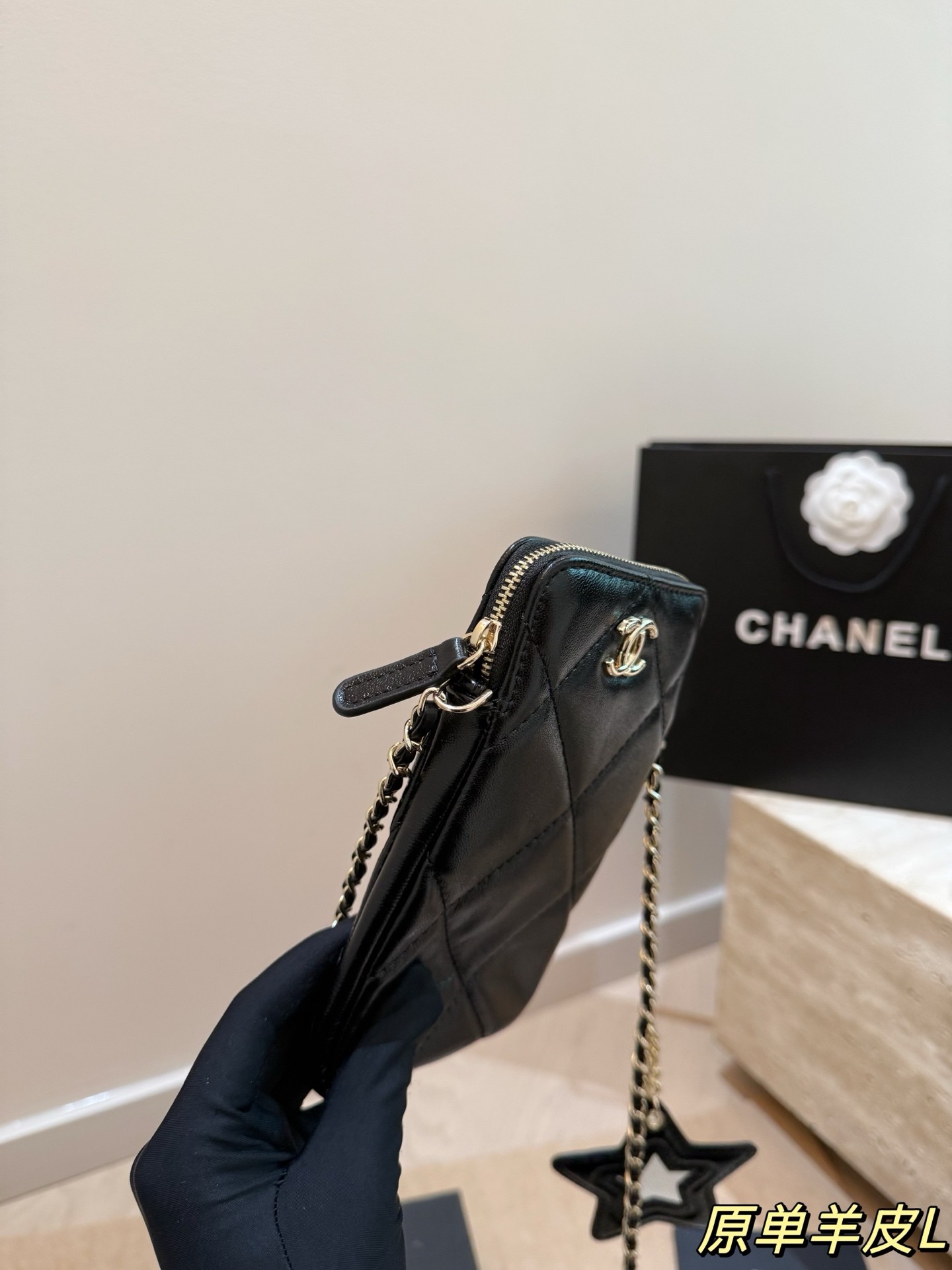 Chanel chain-strap phone case
