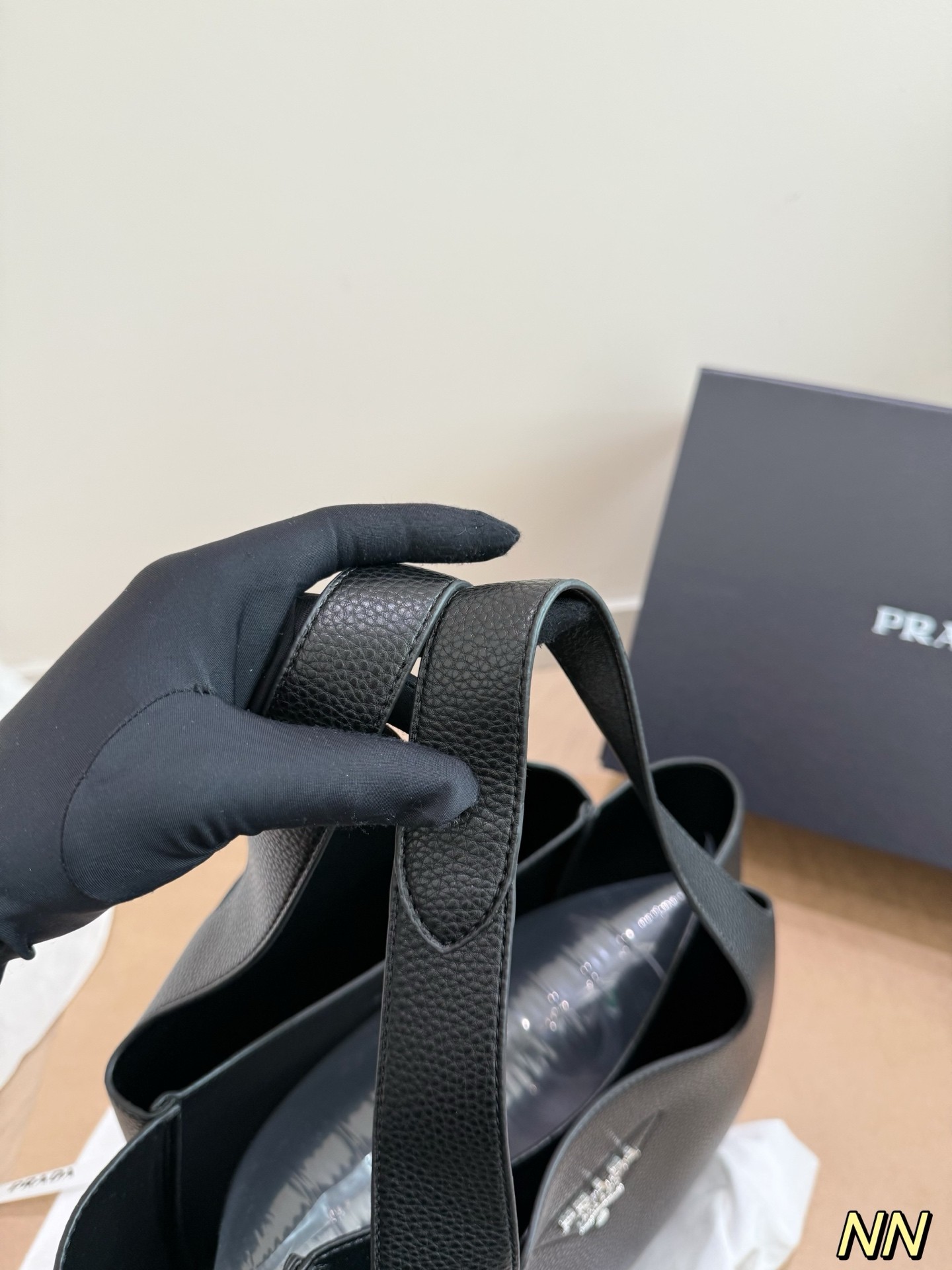 (Prada) black leather handbag