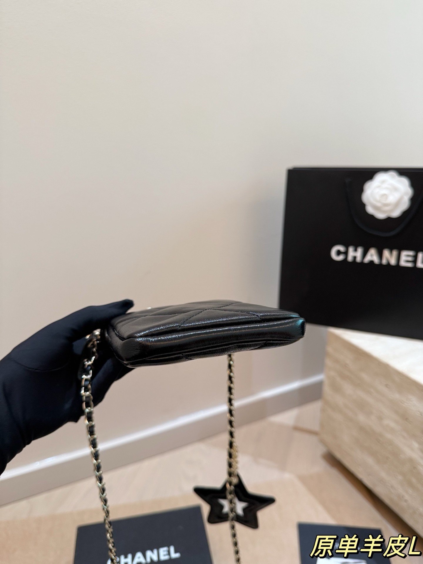 Chanel chain-strap phone case