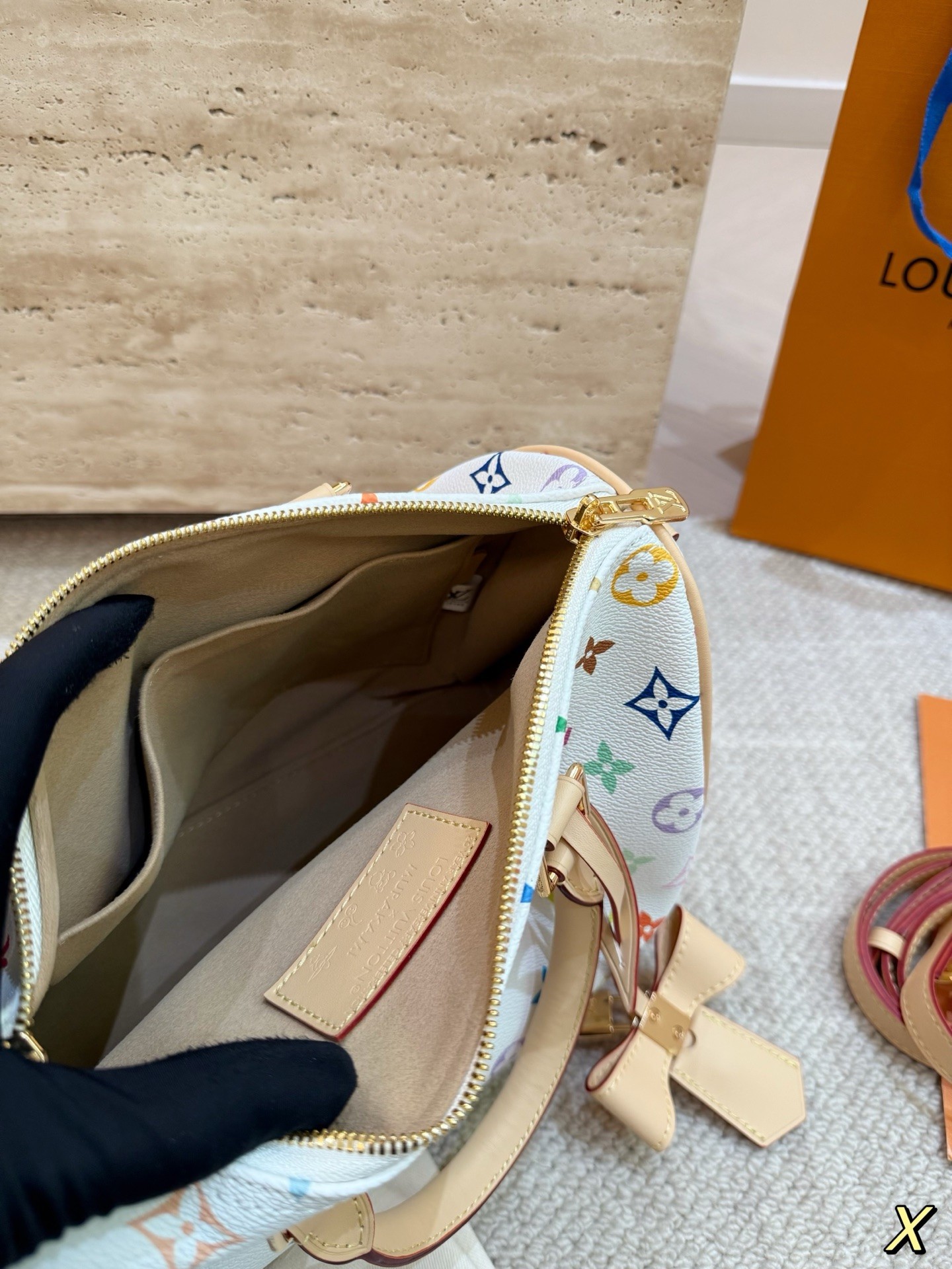 The limited-edition Speedy Bandoulière 25 from Louis Vuitton's collaboration with Japanese artist Takashi Murakami.