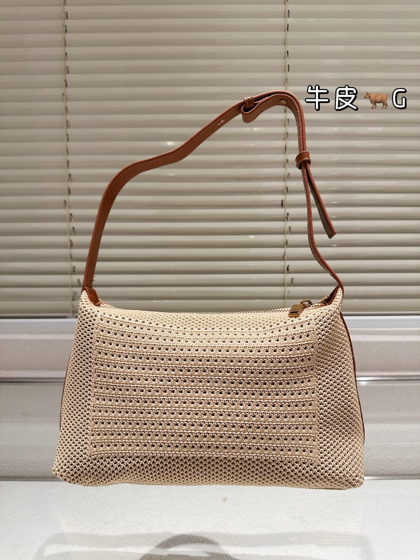 Sac à bandoulière Saint Laurent Oxalis en raphia.