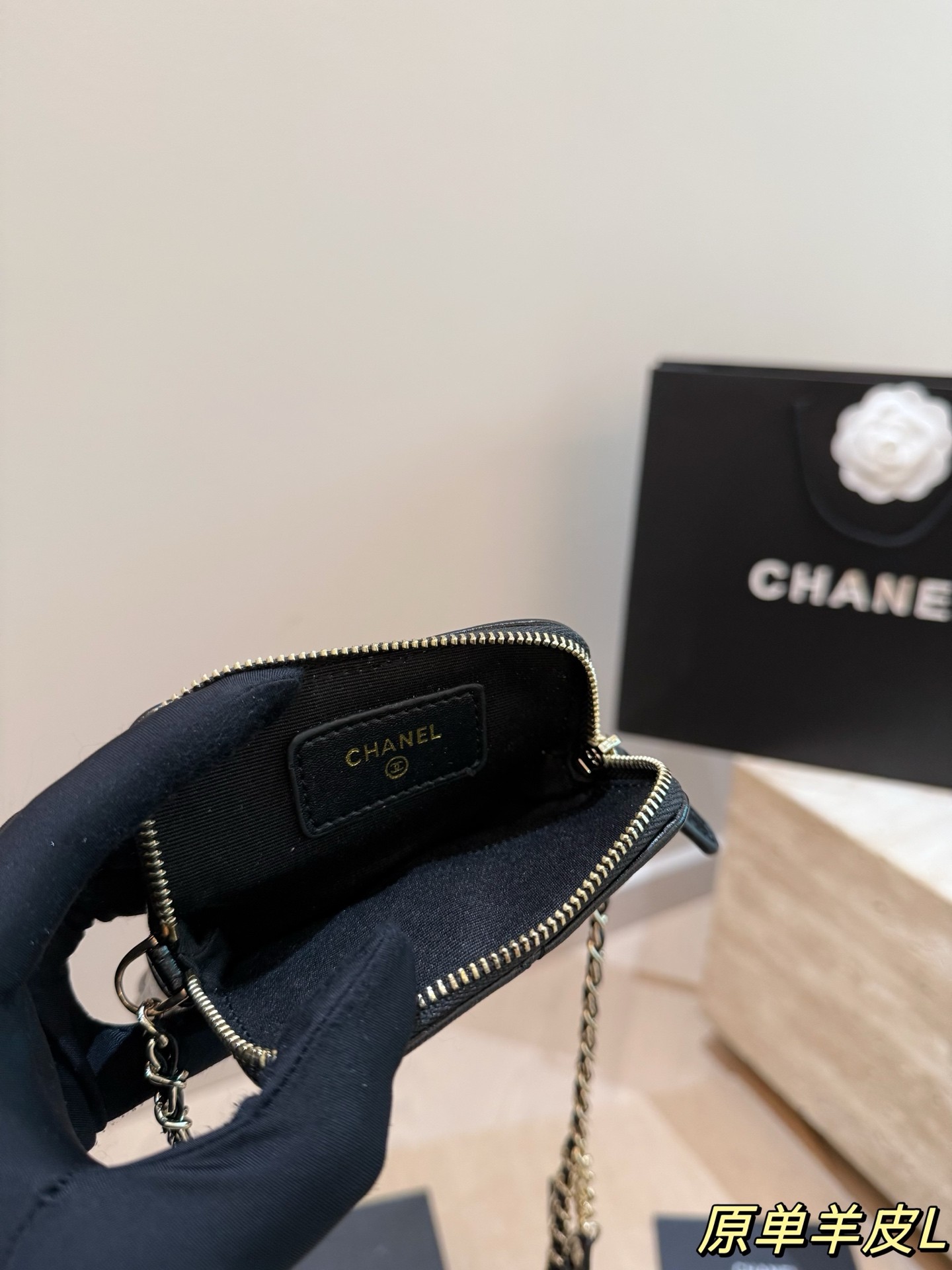 Chanel chain-strap phone case