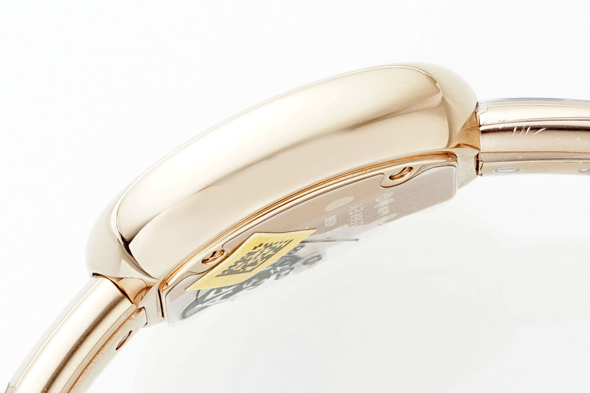 (Cartier) Miniature Gold Bracelet Watch from the Baignoire Collection